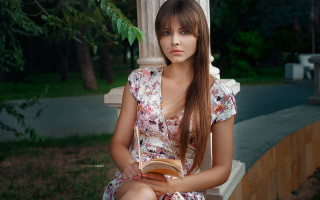 Woman bench book serious portrait - a bench holding free wallpaper