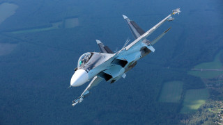 Fighter jet flying over forest - aleksandr gerasimov free wallpaper