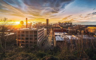 City skyline sunset cloudy horizon - a few building free wallpaper