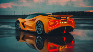 Yellow sports car cloudy sky 4 - a yellow sports car free wallpaper