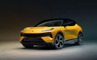 Yellow sports car studio photo 3 - a gray background behind free wallpaper