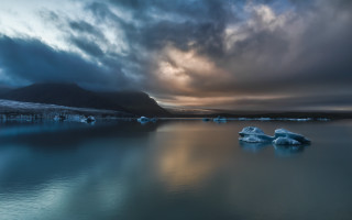Iceberg water mountain sky reflection - a mountain in the distance free wallpaper