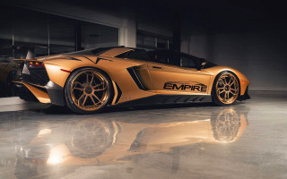 Gold sports car garage open - luxury free wallpaper
