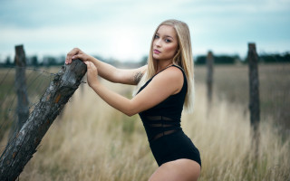 Black bodysuit woman fence tall - a black bodysuit free wallpaper