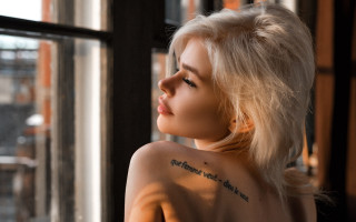 White hair tattoo woman outside - a brick wall free wallpaper