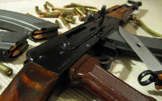 Gun table items surrounding laying - rpg free wallpaper