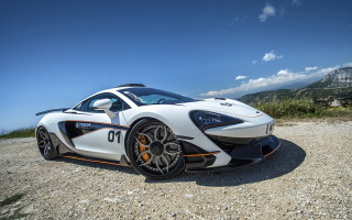 White sports car mountain road 5 - a gravel road next free wallpaper