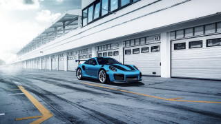 Blue sports car garage street - a yellow line free wallpaper