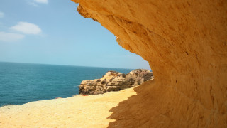 Ocean cliff beach rock boat - exekia free wallpaper