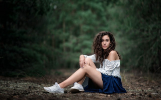 Woman forest sitting white shirt - blue skirt free wallpaper