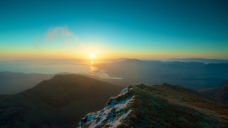 Sunset mountain lake hills coast - a few hill free wallpaper