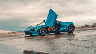 Blue sports car open road - a wet road free wallpaper