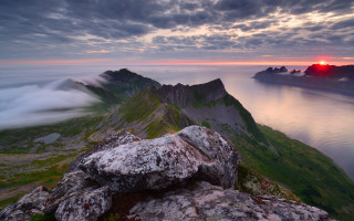 Mountain sunset clouds water landscape - a body of water below free wallpaper