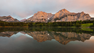 Mountain reflection forest lake sky - a cloudy sky in the background free wallpaper