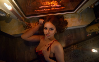 Woman red dress fireplace candles - a fireplace free wallpaper