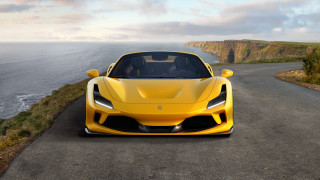Yellow sports car ocean cliffs 2 - a yellow sports car free wallpaper