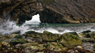 Cave entrance wave rocks outcropping - adobe lightroom free wallpaper