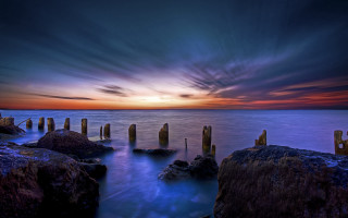 Sunset water mountains island reflection - rock free wallpaper