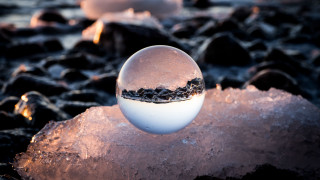 Snow globe ice rocks water - ice free wallpaper