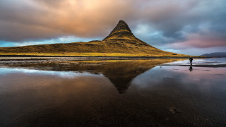 Beach mountain cloudy sky reflection - the water and a person free wallpaper