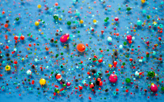Blue background colored balls confetti - damien hirst free wallpaper