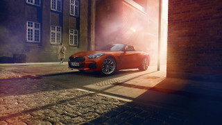 Red sports car brick building 7 - a street next free wallpaper