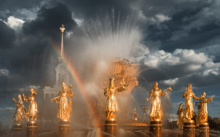 Rainbow skyline fountain sculptures night - a rainbow free wallpaper