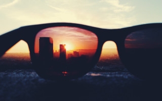 Sunglasses sunset city reflection beach - a pair of sunglasses free wallpaper