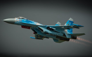 Fighter jet cloudy sky red 11 - a red tail free wallpaper