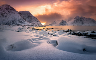 Snowy mountains water sunset clouds - a sunset in the background free wallpaper