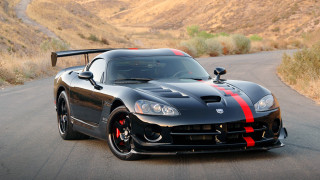 Black sports car red stripe 2 - a road in the desert free wallpaper