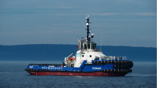 Tugboat mountain water ocean sun - private press free wallpaper