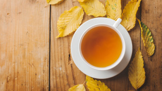 Tea leaves wooden table top - a cup of tea free wallpaper