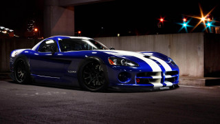 Blue sports car white stripes 2 - a street light in the background free wallpaper