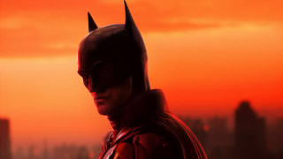 Batman man sunset city red - a man in a batman costume free wallpaper