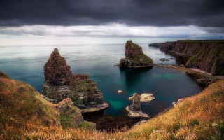 Large water rocky cliff lake - david paton free wallpaper