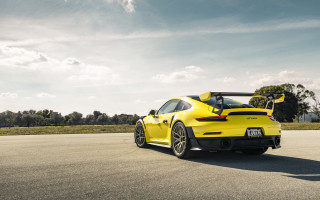 Yellow sports car surfboard open - its door free wallpaper