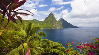 Tropical island mountain water boat - a tropical island free wallpaper