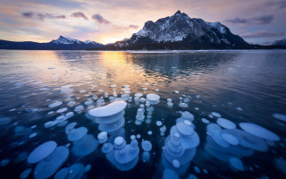 Lake mountains ice sunset water - a large body of water free wallpaper