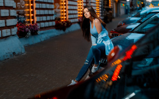 Woman sitting car parkinglot cityscape - a car in a parking lot free wallpaper