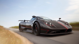 Black sports car road sky - a sky background and grass free wallpaper