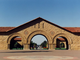 Large stone building clock circular - ambrose mccarthy patterson free wallpaper