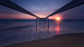 Sunset pier beach ocean waves - wave free wallpaper