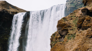 Waterfall man cliff bird nature - bernt tunold free wallpaper