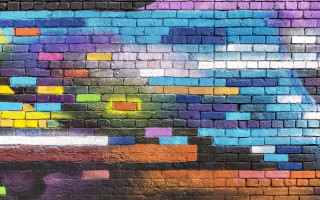 Colorful brick wall truck rainbow - sky in the background free wallpaper