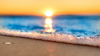 Wave sunset ocean beach bokeh - the background and the ocean in the foreground free wallpaper