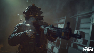 Man gasmask gun dark room - a man in a gas mask holding free wallpaper