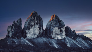 Mountain range sunset pink sky 7 - the foreground and a sunset in the background free wallpaper