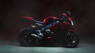 Red motorcycle studio 3d render - studio photography free wallpaper