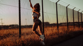 Woman tennis fence sunset honeycomb - a tennis racket free wallpaper